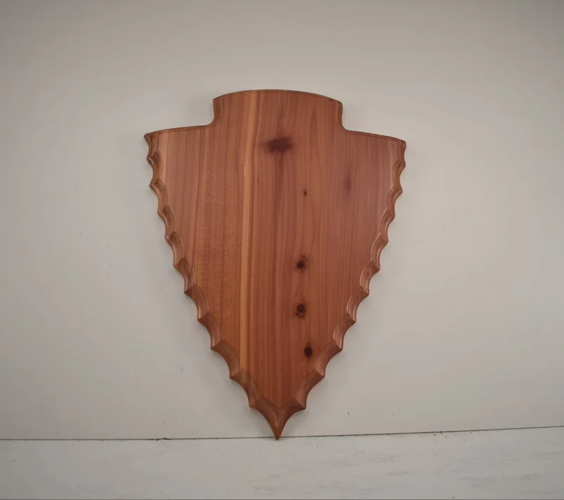 Arrowhead antler taxidermy plaque made of solid hardwood, ideal for deer antler mounts.
