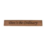 Reclaimed barn wood block sign that reads, "Don't Be Ordinary".