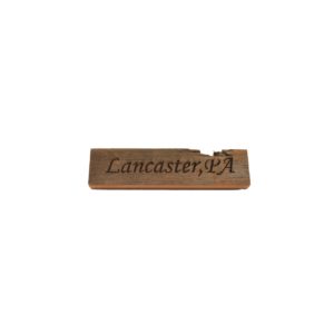 Reclaimed barn wood block sign that reads, "Lancaster, PA".